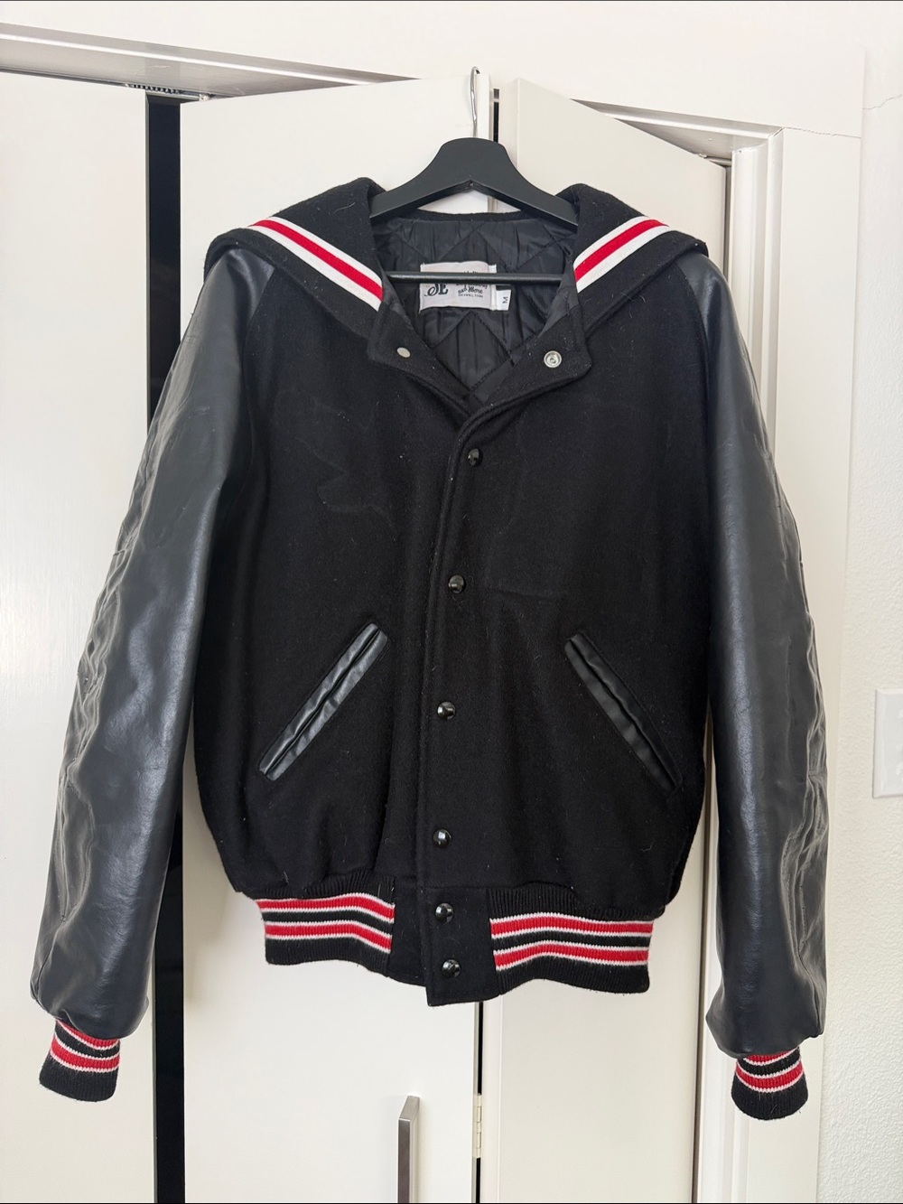 Black Varsity Jacket with Red & White Stripe Trim